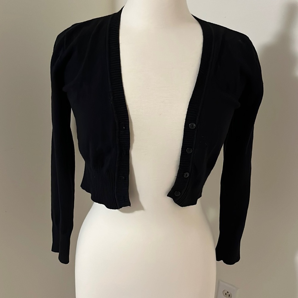 Black shrug. Juniors large.